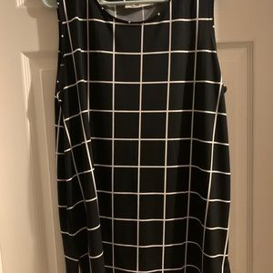 Sleeveless window pane top